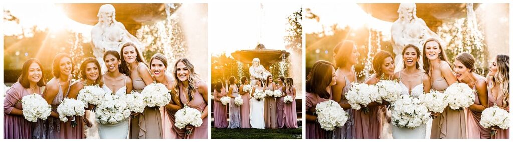 bridal party at sunset in front of fountain during tudor arms hotel wedding day