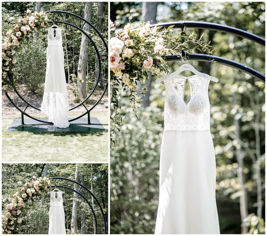 wedding dress hanging up at sapphire creek winery wedding captured by three and eight photography
