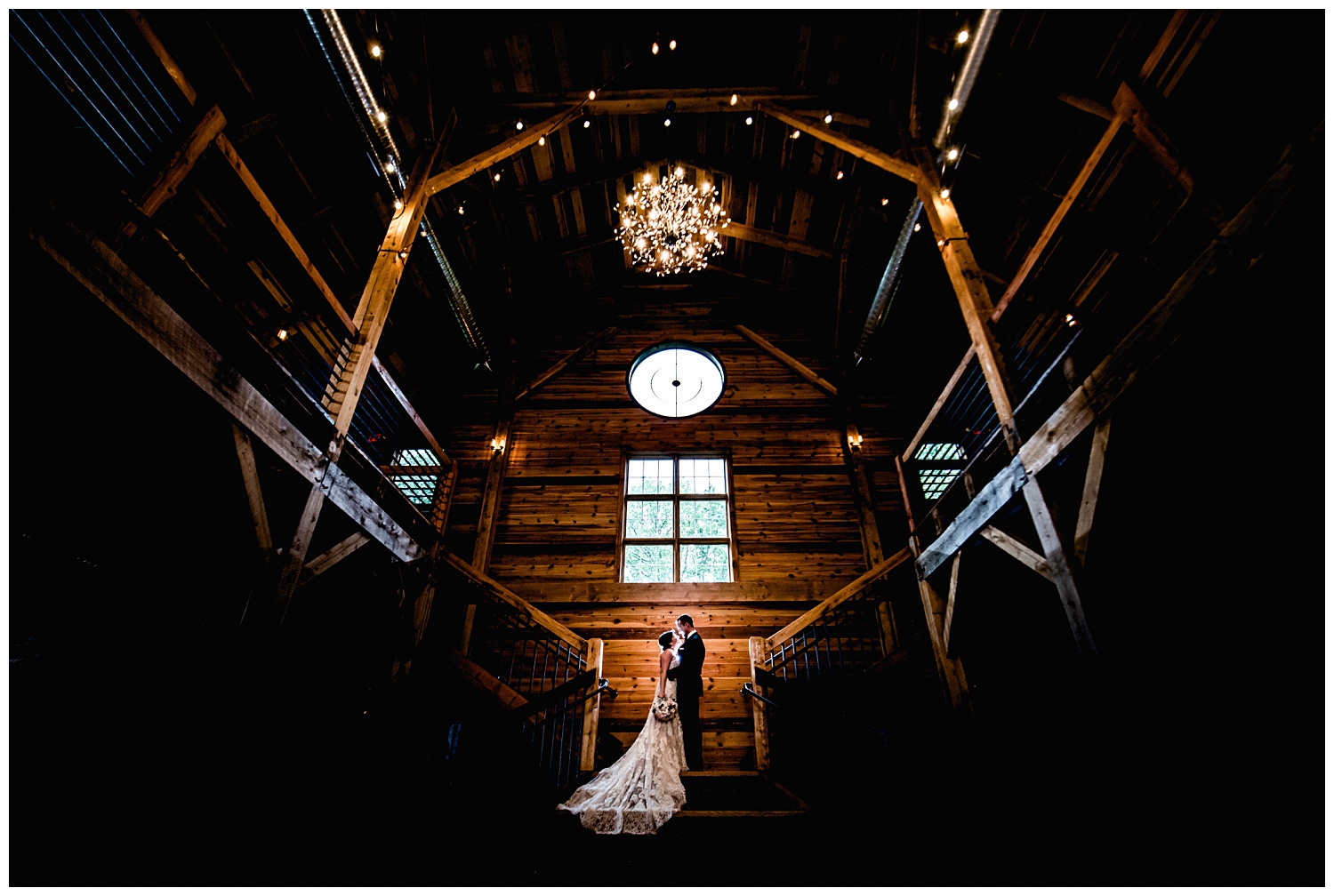 photo of bride and groom in the barn at mapleside farm wedding captured by three and eight photography