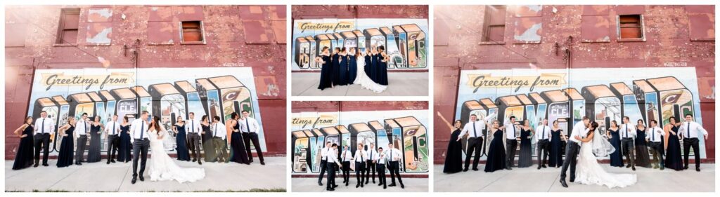 bridal party in front of greetings from cleveland mural on northeast ohio wedding day