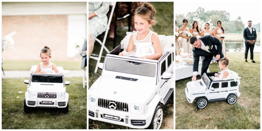 flower girl riding down the aisle in car at avalon country club wedding in warren