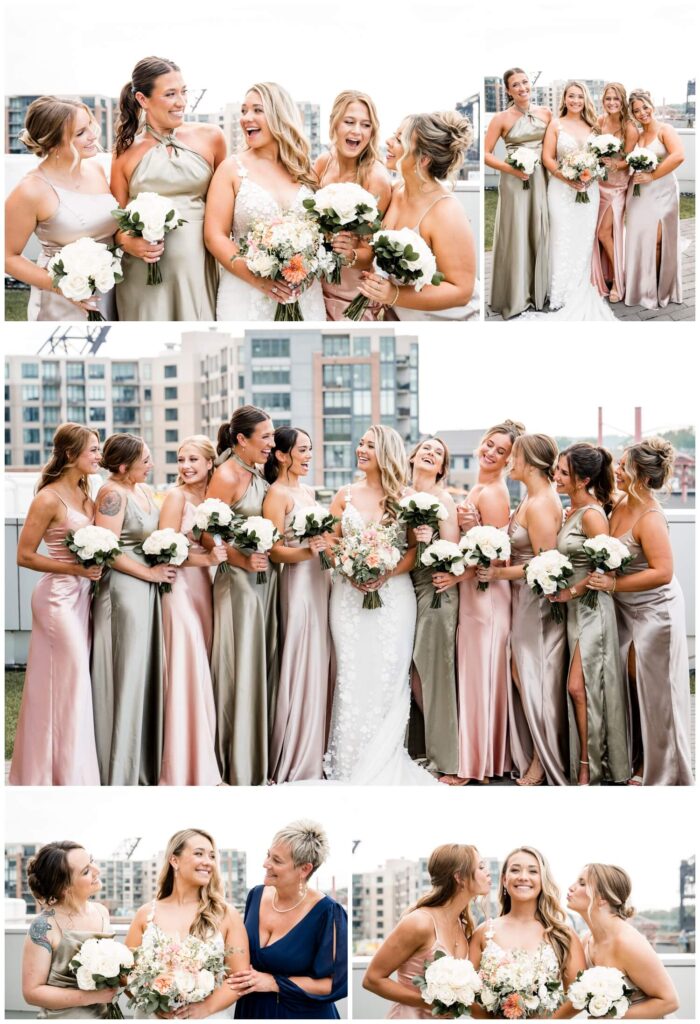 bride posing with bridesmaids at aloft downtown cleveland wedding