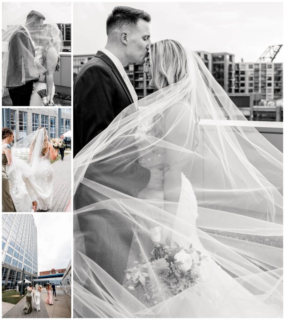 bride and groom in black and white with veil over them in downtown cleveland