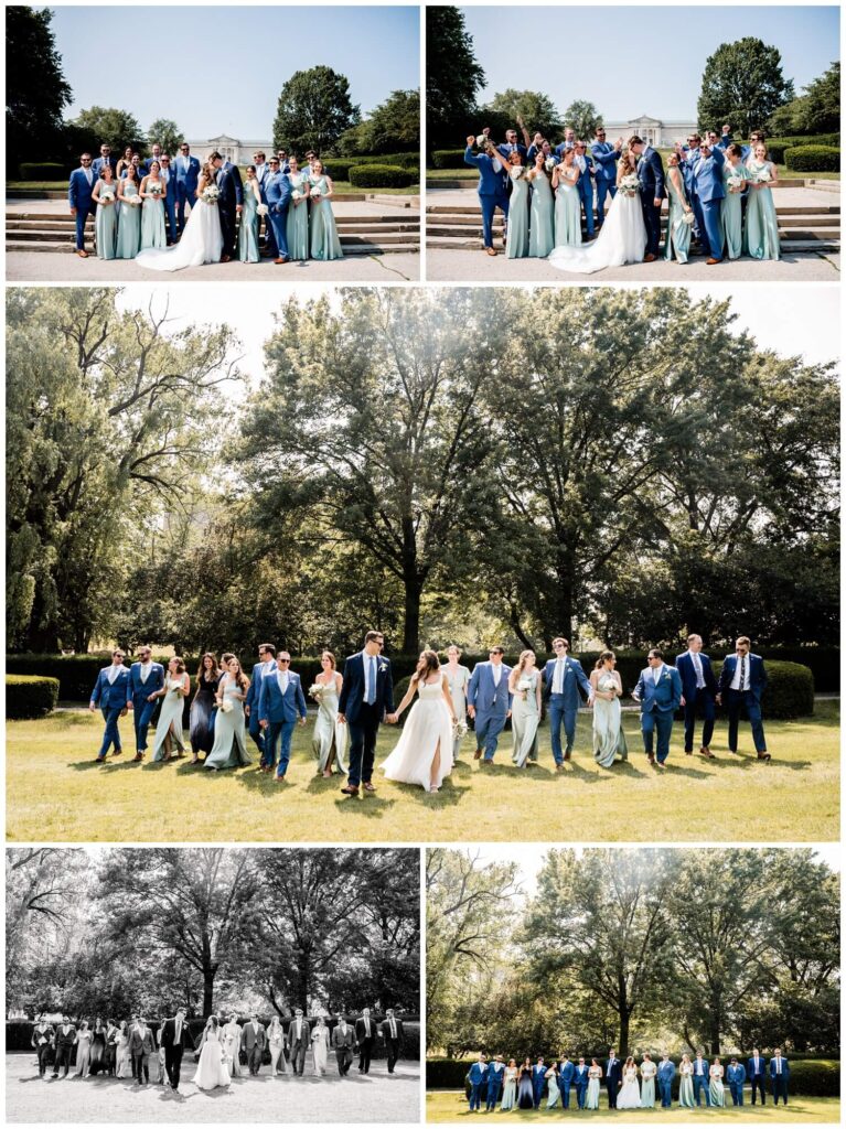 bride and groom pose with bridal party on the lawn of the cleveland art museum