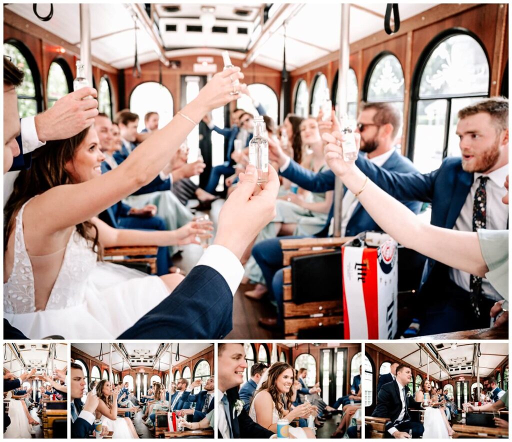 bride and groom riding on trolley taking shots with bridal party on cleveland wedding day