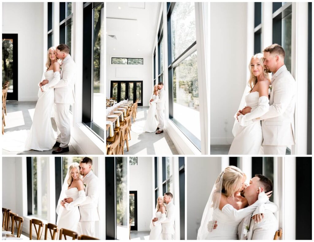 bride and groom posing inside of the wellspring in front of large window