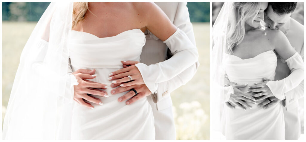 groom hugging bride from behind and kissing her shoulder