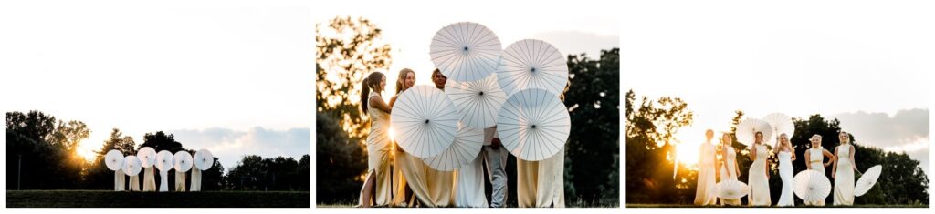 bride and bridesmaids posing at sunset with parasols